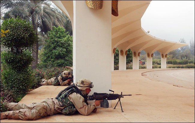 Members of the Army's Third Infantry Division, outside the V.I.P. terminal of Saddam International Airport, Baghdad, April 4, 2003.